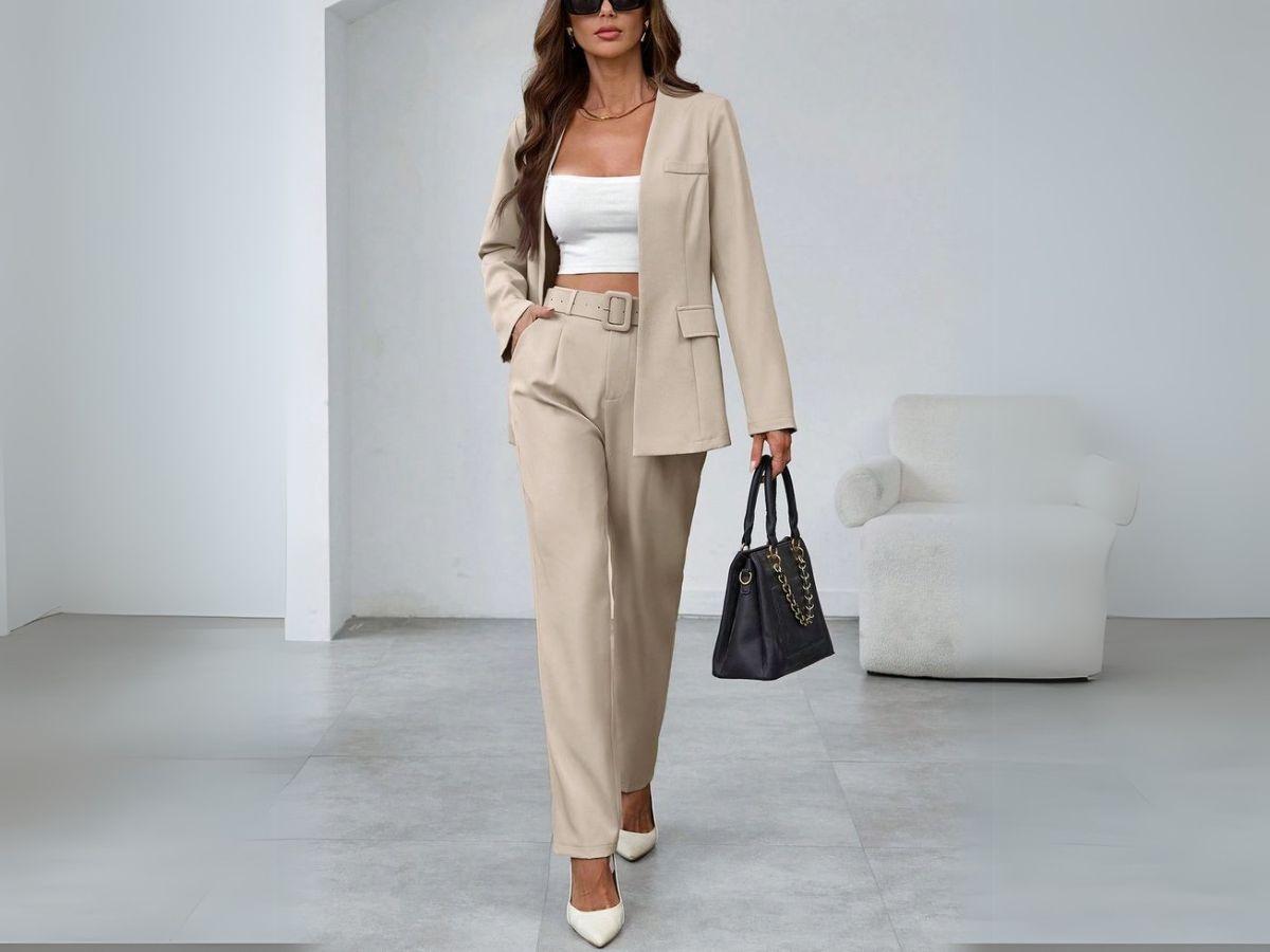 Tóc xoăn kết hợp cùng vest nữ mang đến sự thanh lịch