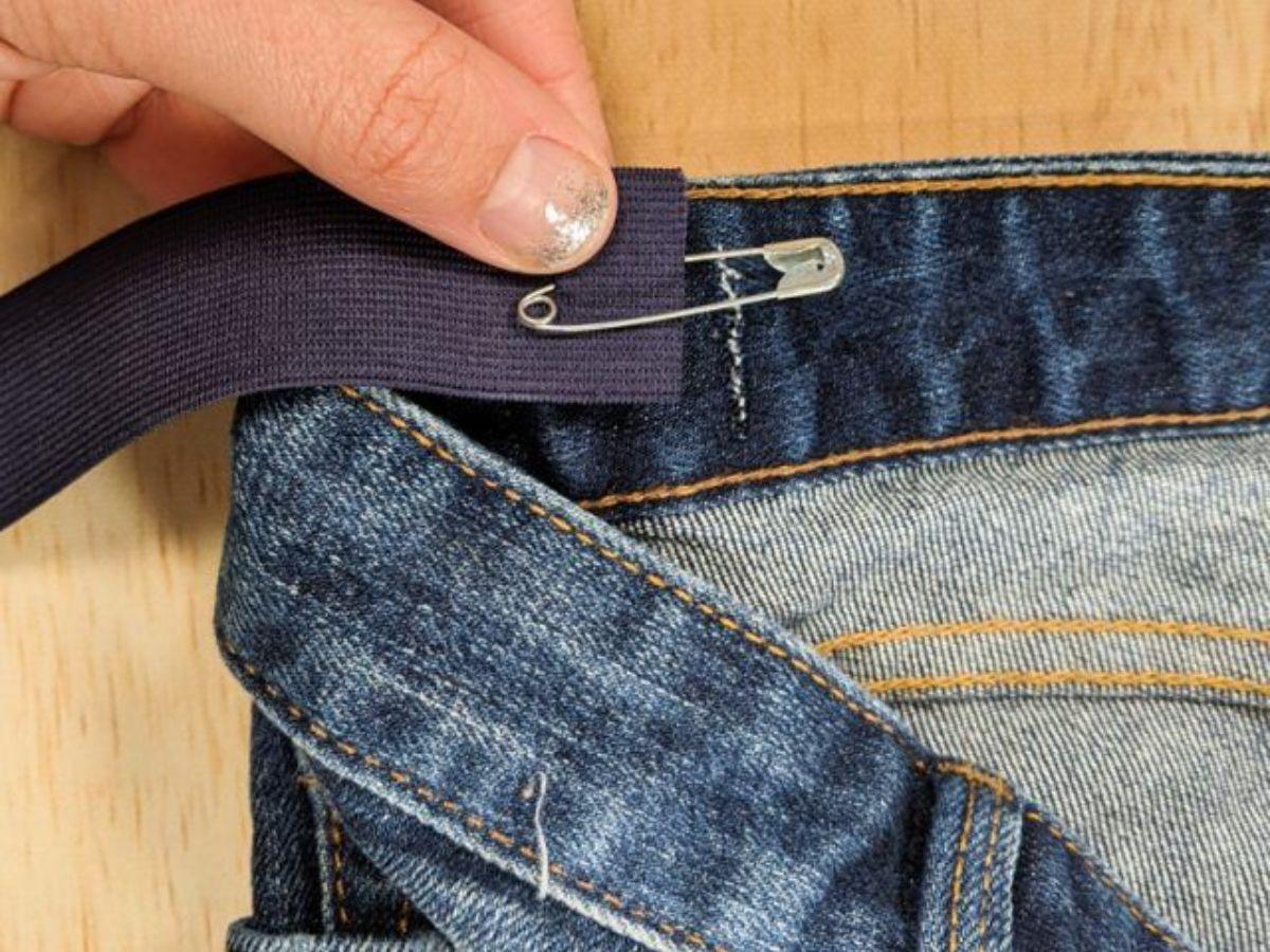 May nới lưng quần bằng cách mở đường may