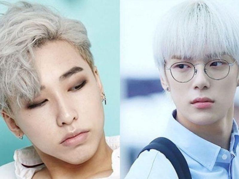 Chàng trai với tóc bạch kim và khuôn mặt phù hợp