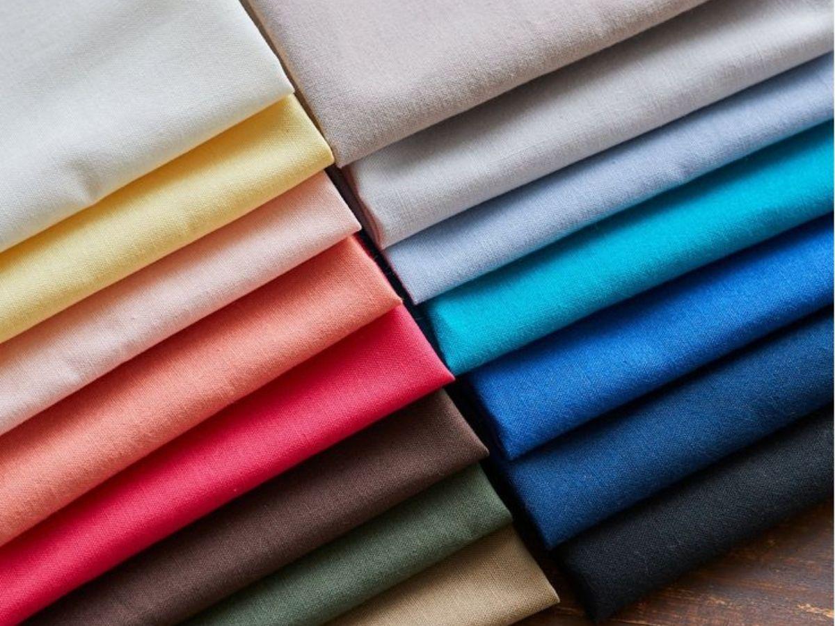 Nên chọn loại vải 100% cotton cho đồng phục team building