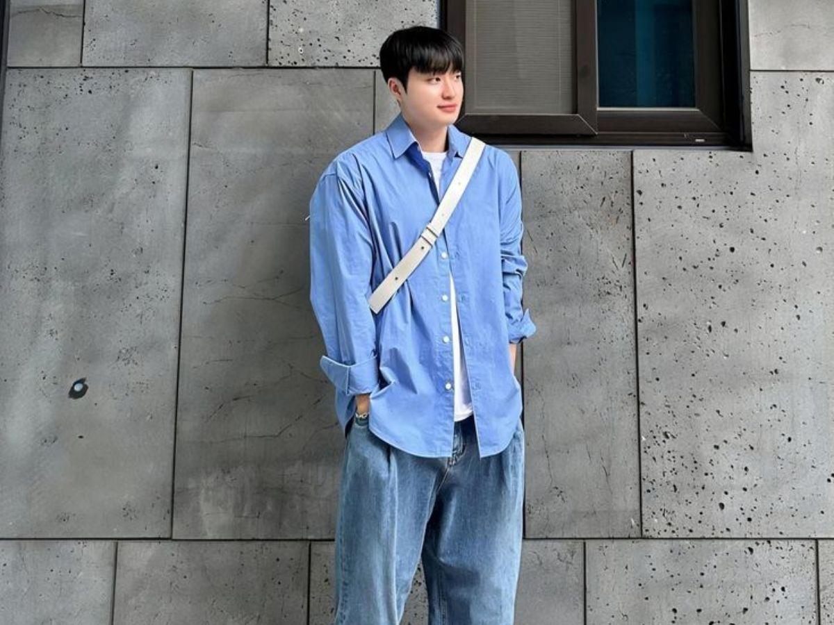 Layering với áo sơ mi khoác ngoài và quần jean ống rộng tạo vẻ ngoài năng động