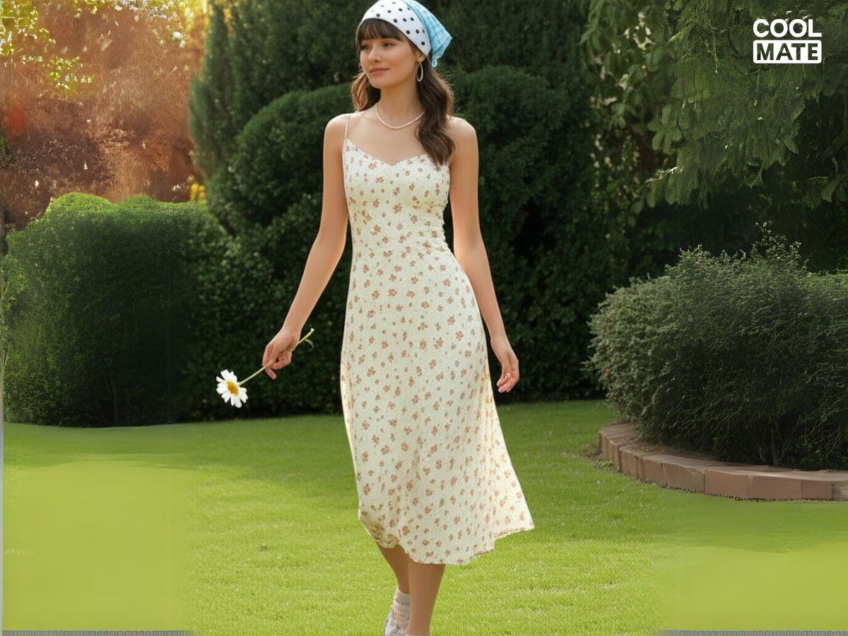 Váy hoa nhí vintage phối cùng băng đô lụa chấm bi tạo vẻ nhẹ nhàng, cổ điển
