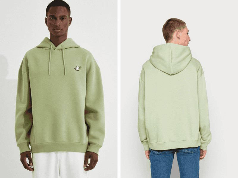 Áo hoodie xanh lá pastel với quần jeans xanh nhạt tạo sự năng động cho chàng