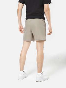 Product side /image/March2025/quan-nam-travel-short-7-inch-Xam_2.jpg